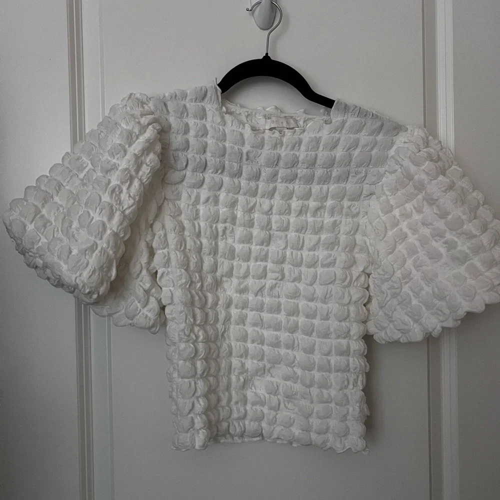 Anthropogie Eri + Ali Textured Puff-Sleeve Top - Picture 5 of 10